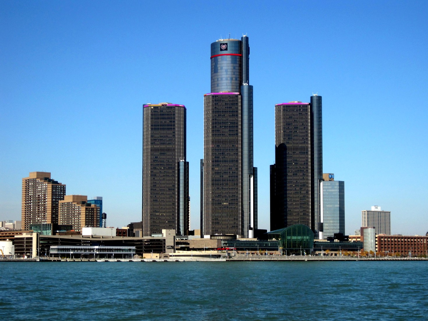 The Renaissance Center towers on the Detroit riverfront, seen across the Detroit River.