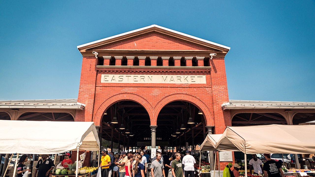 Shoppers and vendor tents outside Shed 2 at Detroit’s Eastern Market, in a 2014 file photo.